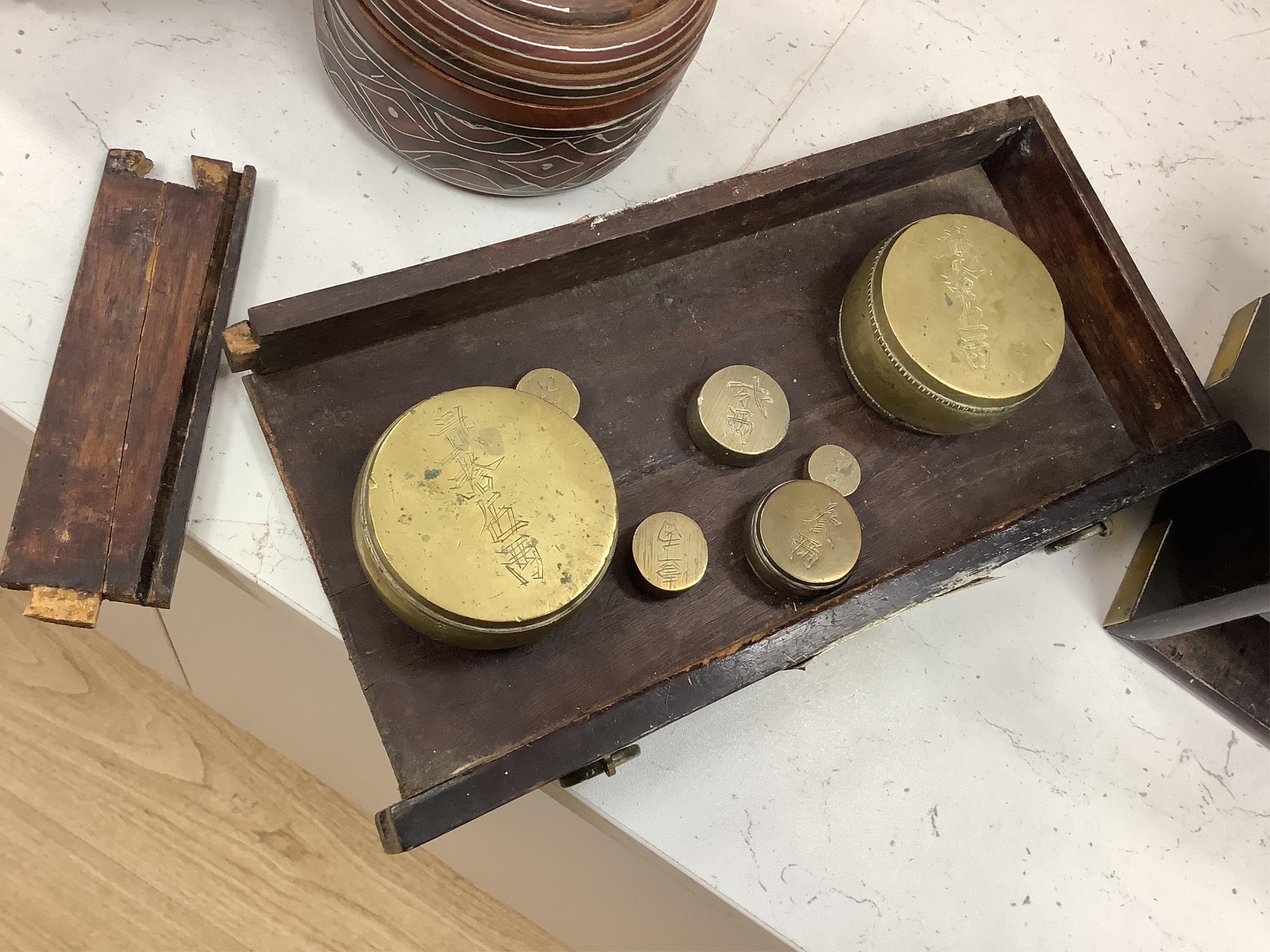 A pair of 19th century Japanese wood and brass mounted scales and weights, 31.5cm wide